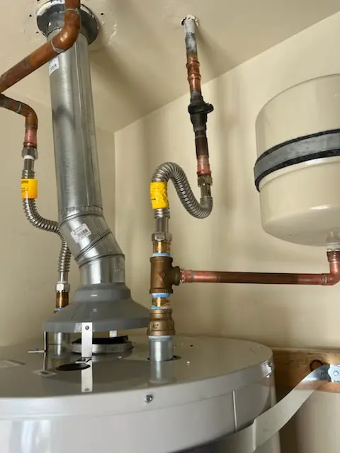 Water heater installation and plumbing repair in Mansefield
